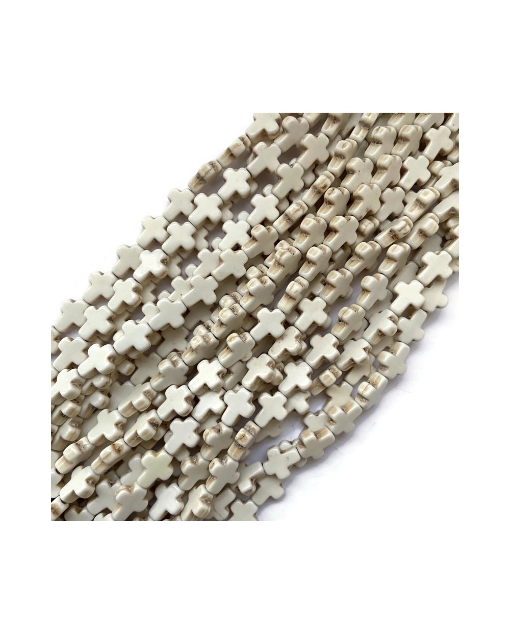Howlit krzyżyk 10x8x3mm sznurek ecru
