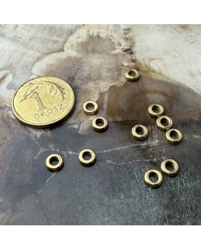 Przekładka do koralików oponka 4x1mm stal nierdzewna złota